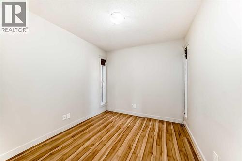 1156 Sherwood Boulevard Nw, Calgary, AB - Indoor Photo Showing Other Room