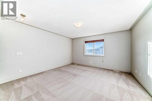 1156 Sherwood Boulevard Nw, Calgary, AB - Indoor Photo Showing Other Room