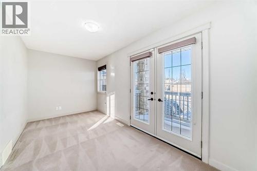 1156 Sherwood Boulevard Nw, Calgary, AB - Indoor Photo Showing Other Room