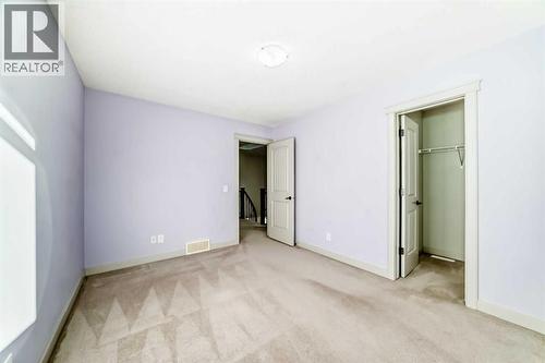 1156 Sherwood Boulevard Nw, Calgary, AB - Indoor Photo Showing Other Room