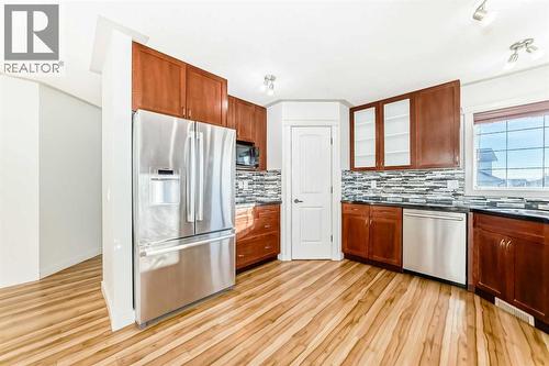 1156 Sherwood Boulevard Nw, Calgary, AB - Indoor Photo Showing Kitchen With Double Sink