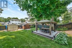 Outdoor dining under the shade of mature trees. - 