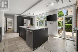 Quartz countertops, stainless steel appliances. - 