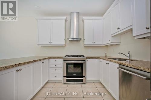 21 Wozniak Crescent, Markham, ON - Indoor Photo Showing Kitchen With Double Sink