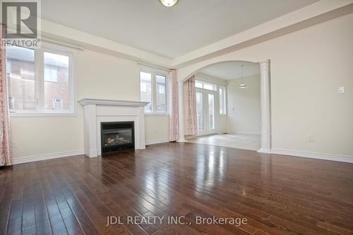 21 Wozniak Crescent, Markham, ON - Indoor Photo Showing Living Room With Fireplace