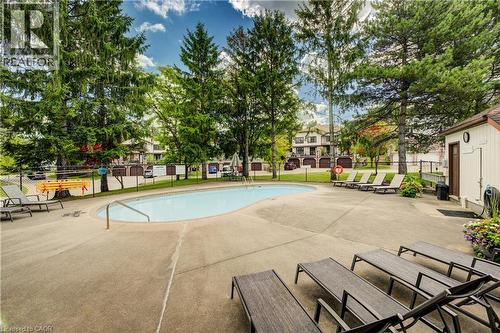 493 Beechwood Drive Unit# 4, Waterloo, ON - Outdoor With In Ground Pool