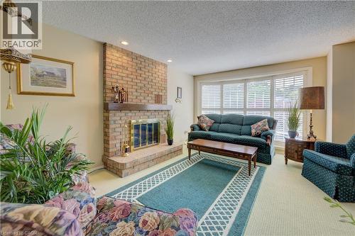 493 Beechwood Drive Unit# 4, Waterloo, ON - Indoor Photo Showing Living Room With Fireplace