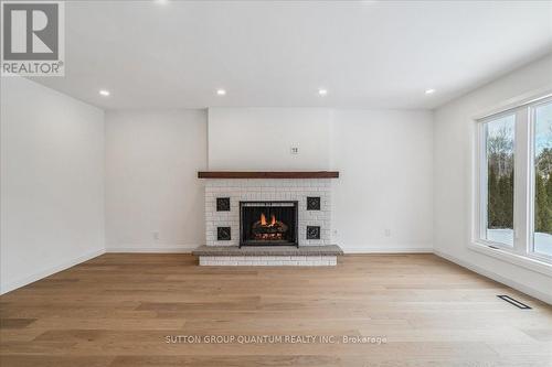 Family - 82 Marilyn Street, Caledon, ON - Indoor Photo Showing Other Room With Fireplace