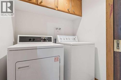 124 Edgebrook Road Nw, Calgary, AB - Indoor Photo Showing Laundry Room