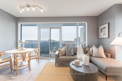 805-65 Speers Road, Oakville, ON - Indoor Photo Showing Living Room