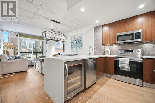 1013 - 333 Adelaide Street E, Toronto, ON - Indoor Photo Showing Kitchen With Fireplace