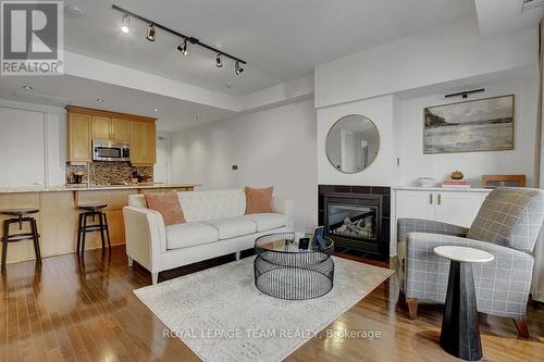 302 - 330 Loretta Avenue S, Ottawa, ON - Indoor Photo Showing Living Room With Fireplace