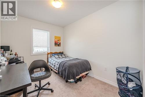 Bedroom with carpet floors and a desk - 23 Kingsbury Square Unit# 23, Guelph, ON - Indoor