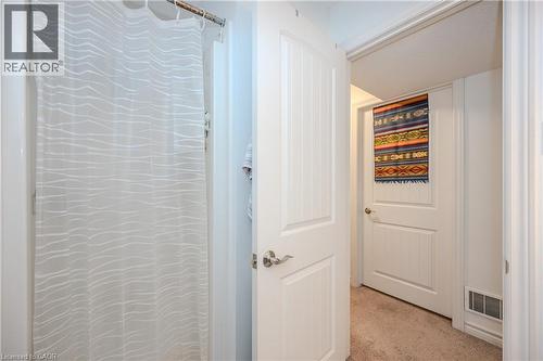 Hall featuring light colored carpet - 23 Kingsbury Square Unit# 23, Guelph, ON - Indoor Photo Showing Other Room