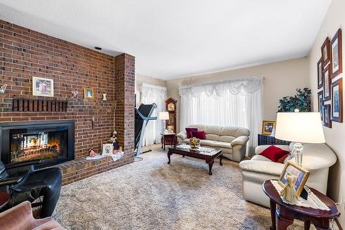 1804 13Th Avenue, Cranbrook, BC - Indoor Photo Showing Living Room With Fireplace