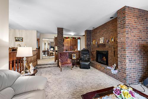 1804 13Th Avenue, Cranbrook, BC - Indoor Photo Showing Living Room With Fireplace