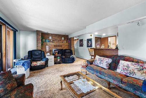 1804 13Th Avenue, Cranbrook, BC - Indoor Photo Showing Living Room With Fireplace