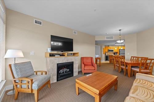 319-4205 Gellatly Road, West Kelowna, BC - Indoor Photo Showing Living Room With Fireplace