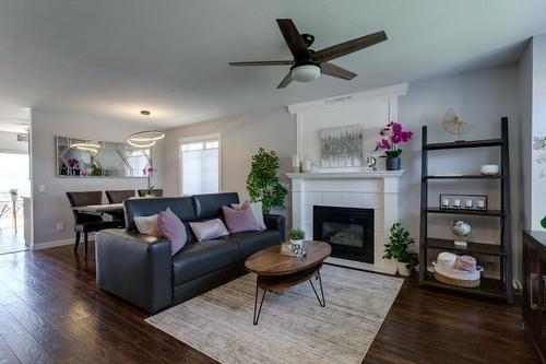 1114-2440 Old Okanagan Highway, West Kelowna, BC - Indoor Photo Showing Living Room With Fireplace