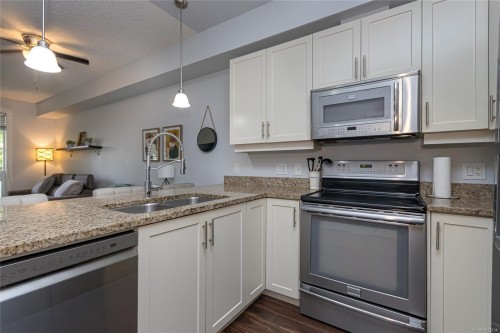 108-938 Dunford Ave, Langford, BC - Indoor Photo Showing Kitchen With Double Sink