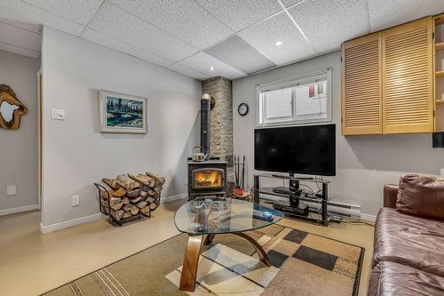 Salle familiale - 3379  - 3381 Rue St-Victorien, Québec (Beauport), QC - Indoor With Fireplace