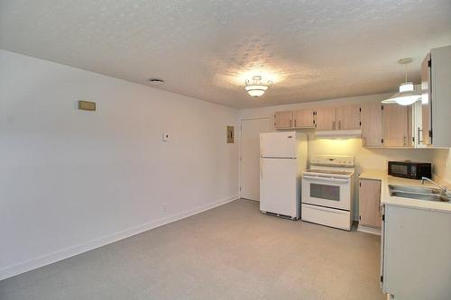 Vue d'ensemble - 1840  - 1840B Rue Duchesne, Val-D'Or, QC - Indoor Photo Showing Kitchen With Double Sink