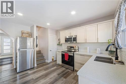411 Fairfield Avenue, Hamilton, ON - Indoor Photo Showing Kitchen With Double Sink