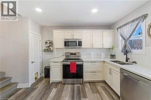 411 Fairfield Avenue, Hamilton, ON - Indoor Photo Showing Kitchen With Double Sink