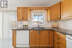 Kitchen Overlooking Backyard - 