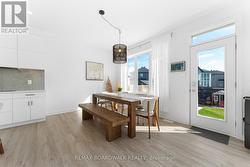 Kitchen is adjacent to the roomy Dining Area - 