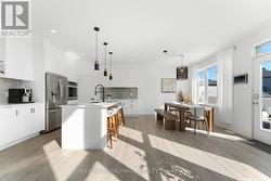 Modern White Kitchen is a Chef's Delight - 