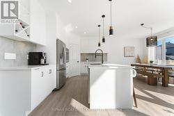 Large Island w/Break Bar & Soft Closing Cabinets - 