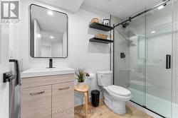 3PC Bath w/Black Accents & a Large Glass Shower - 