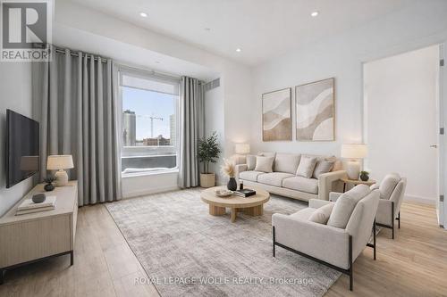 Virtually Staged - 304 - 741 King Street W, Kitchener, ON - Indoor Photo Showing Living Room