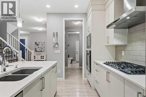 43 Seton Rise Se, Calgary, AB - Indoor Photo Showing Kitchen With Double Sink With Upgraded Kitchen