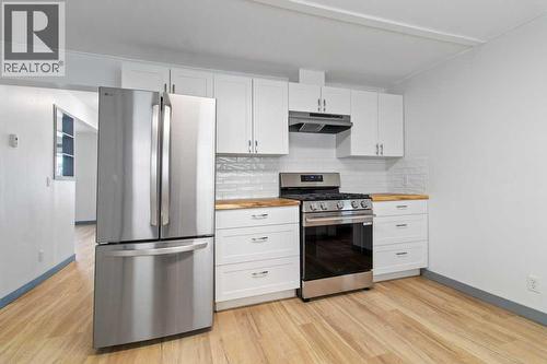 4919 50 Avenue, Morningside, AB - Indoor Photo Showing Kitchen With Stainless Steel Kitchen