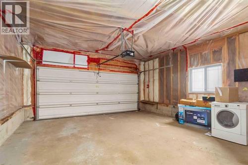 213 Diefenbaker Drive, Fort Mcmurray, AB - Indoor Photo Showing Garage