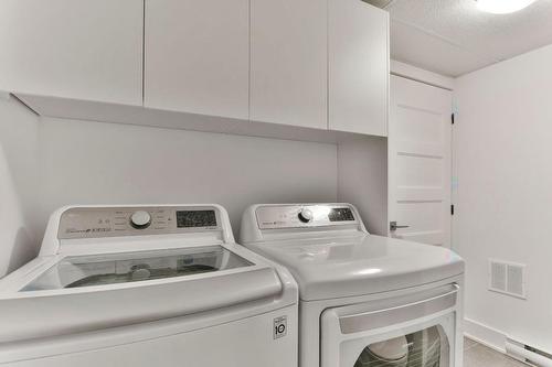 Laundry room - 1584 Rue St-André, L'Assomption, QC - Indoor Photo Showing Laundry Room