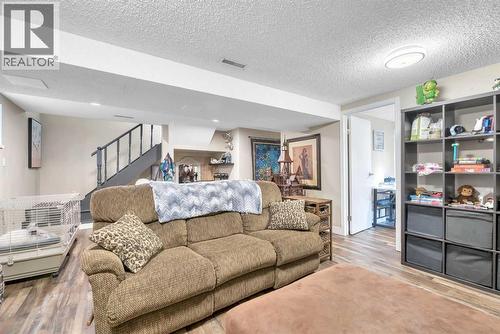 708 Allden Place Se, Calgary, AB - Indoor Photo Showing Living Room