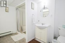 Basement Bathroom (3pc) & Laundry - 