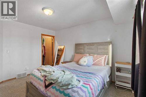 141 Silver Drive, Blackfalds, AB - Indoor Photo Showing Bedroom