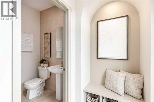 PLEASE NOTE: Photos are of a finished Showhome of the same model – fit and finish may differ on finished spec home. Interior selections and floorplans shown in photos - 129 Raven Link Se, Calgary, AB - Indoor Photo Showing Bathroom