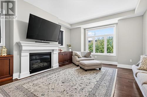 10 Ft Ceilings onthe Main Level - 39 Cairns Gate, King, ON - Indoor Photo Showing Living Room With Fireplace