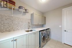 Upgraded Landry Offers Extra Cabinets - 