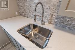 Linen Closet, Bianco Sink and Quartz Countertops - 