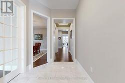 Spacious Hallway With Architectural Ceiling - 