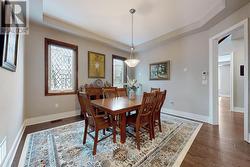 Formal Dining Room With Coffered Ceiling - 