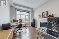 Office w/ Stone Mantle Fireplace and Forest Views - 