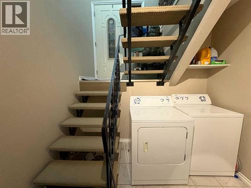 2, 1701 St Edward Boulevard N, Lethbridge, AB - Indoor Photo Showing Laundry Room