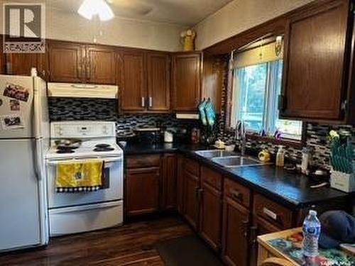 110 South Avenue E, Hafford, SK - Indoor Photo Showing Kitchen With Double Sink